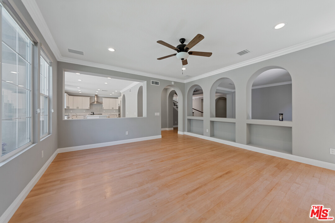 149 Laurel Ridge Drive Simi Valley, CA 93065 - Photo 15 of 53 a view of an empty room with a window and wooden floor