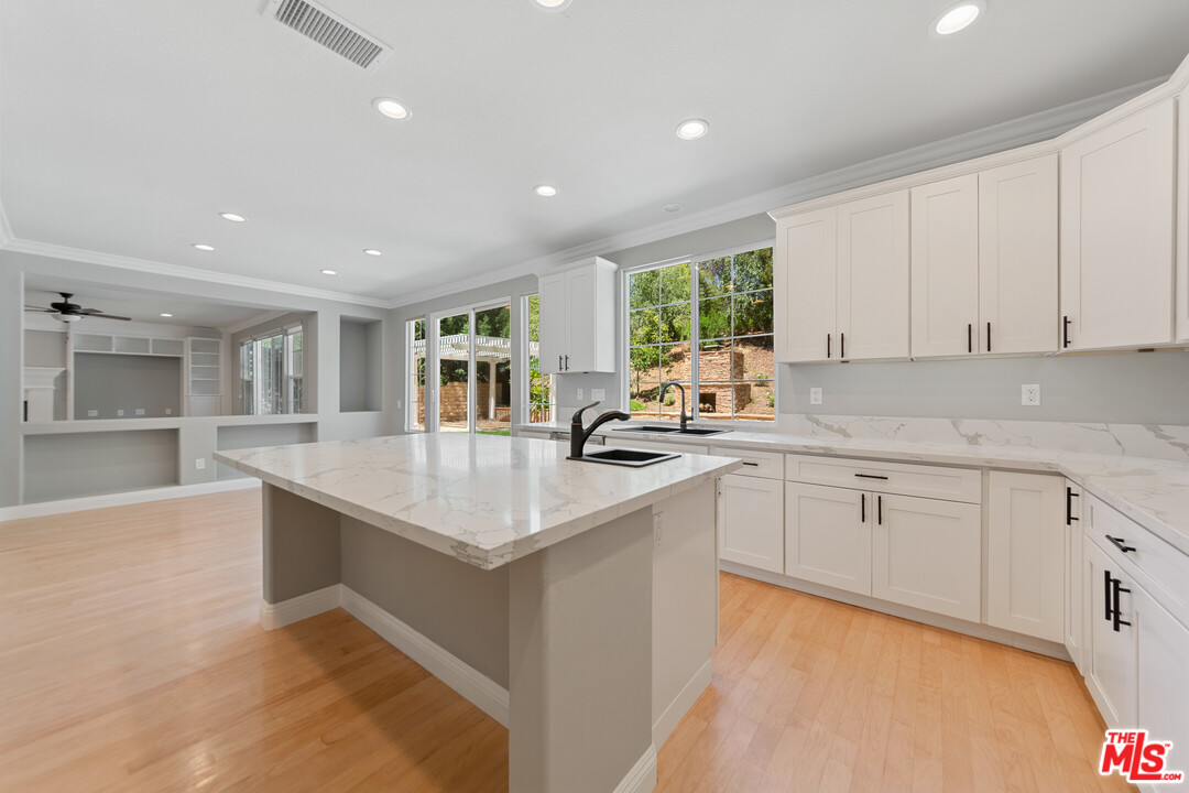 149 Laurel Ridge Drive Simi Valley, CA 93065 - Photo 20 of 53 a kitchen with sink cabinets and window
