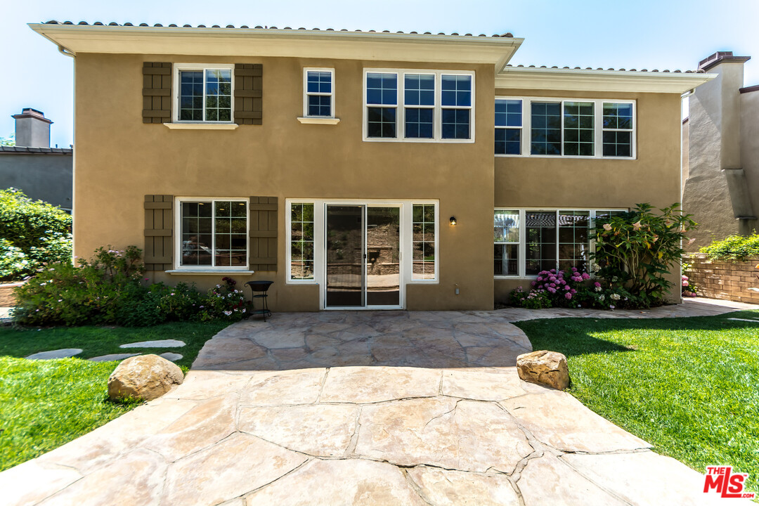 149 Laurel Ridge Drive Simi Valley, CA 93065 - Photo 26 of 53 a front view of a house with garden