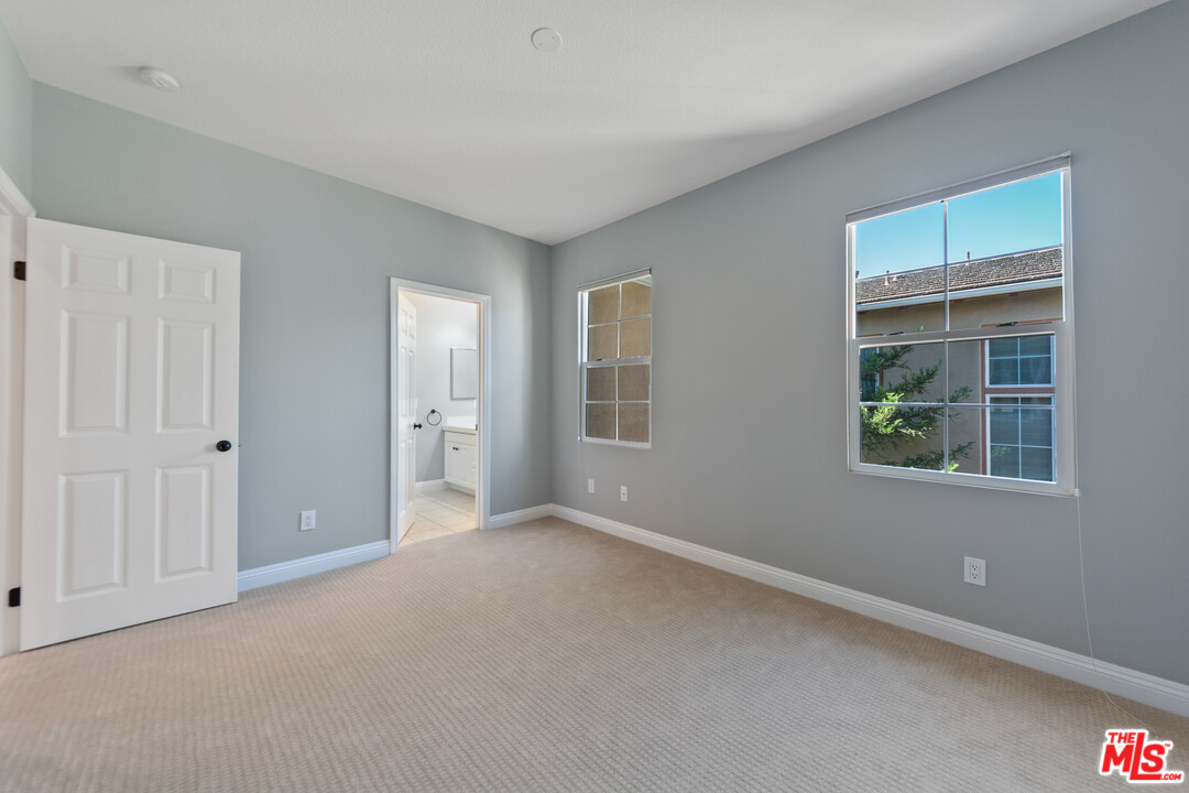 149 Laurel Ridge Drive Simi Valley, CA 93065 - Photo 32 of 53 a view of an empty room with a window