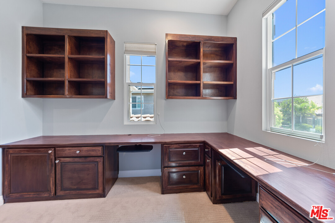 149 Laurel Ridge Drive Simi Valley, CA 93065 - Photo 49 of 53 a kitchen with a cabinets and window
