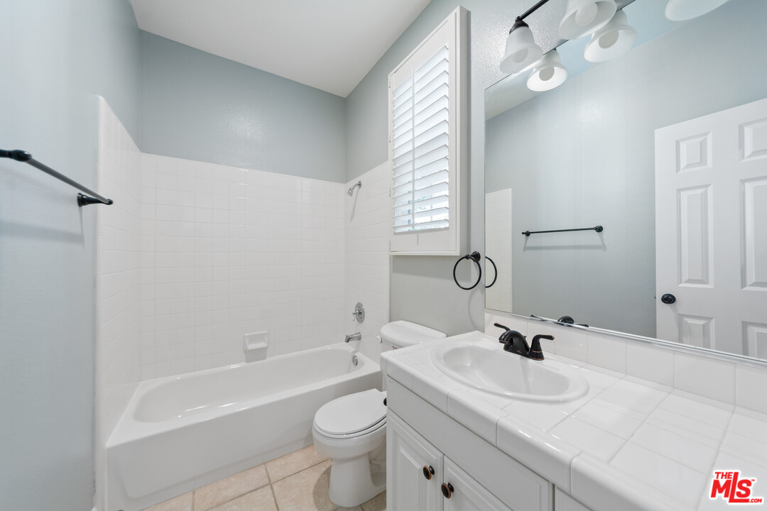 149 Laurel Ridge Drive Simi Valley, CA 93065 - Photo 7 of 53 a bathroom with a sink a toilet and shower