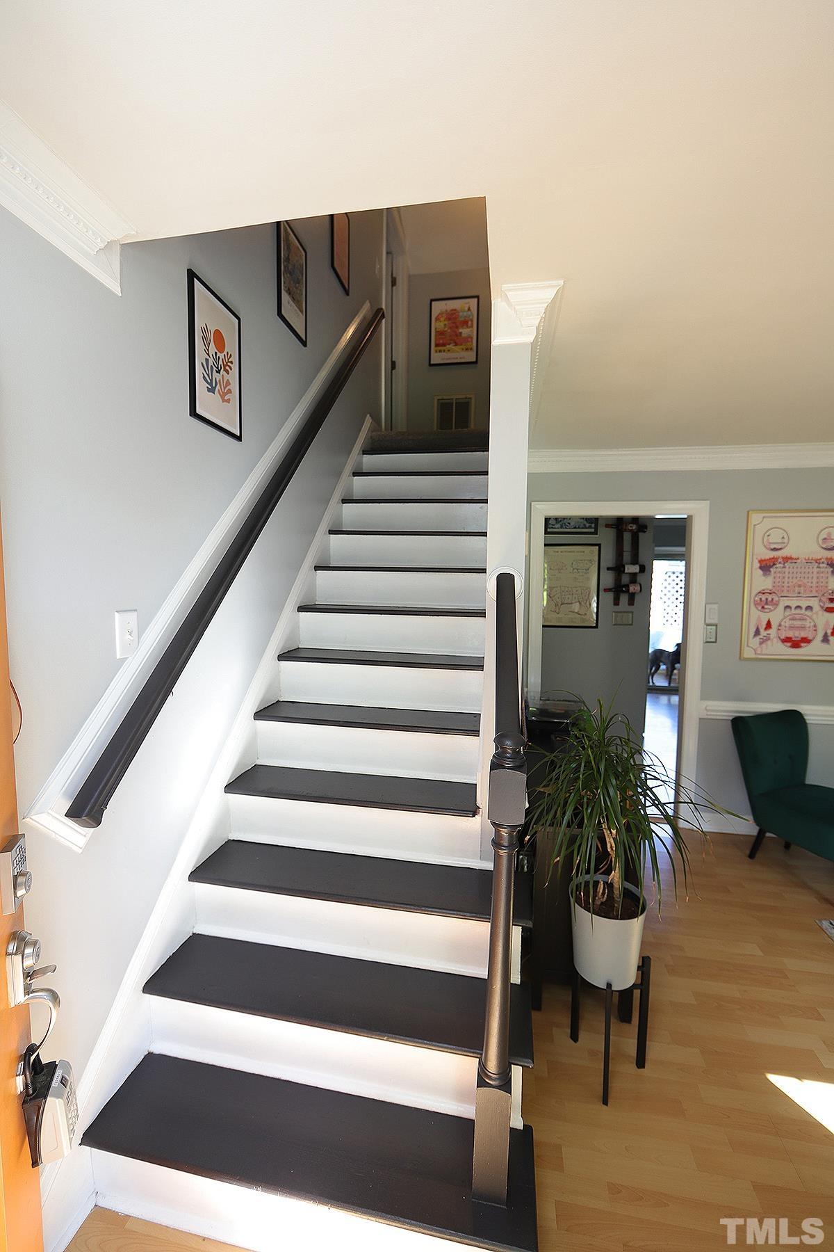 3301 East Jameson Road Raleigh, NC 27604 - Photo 3 of 29 a view of entryway and hall with wooden floor
