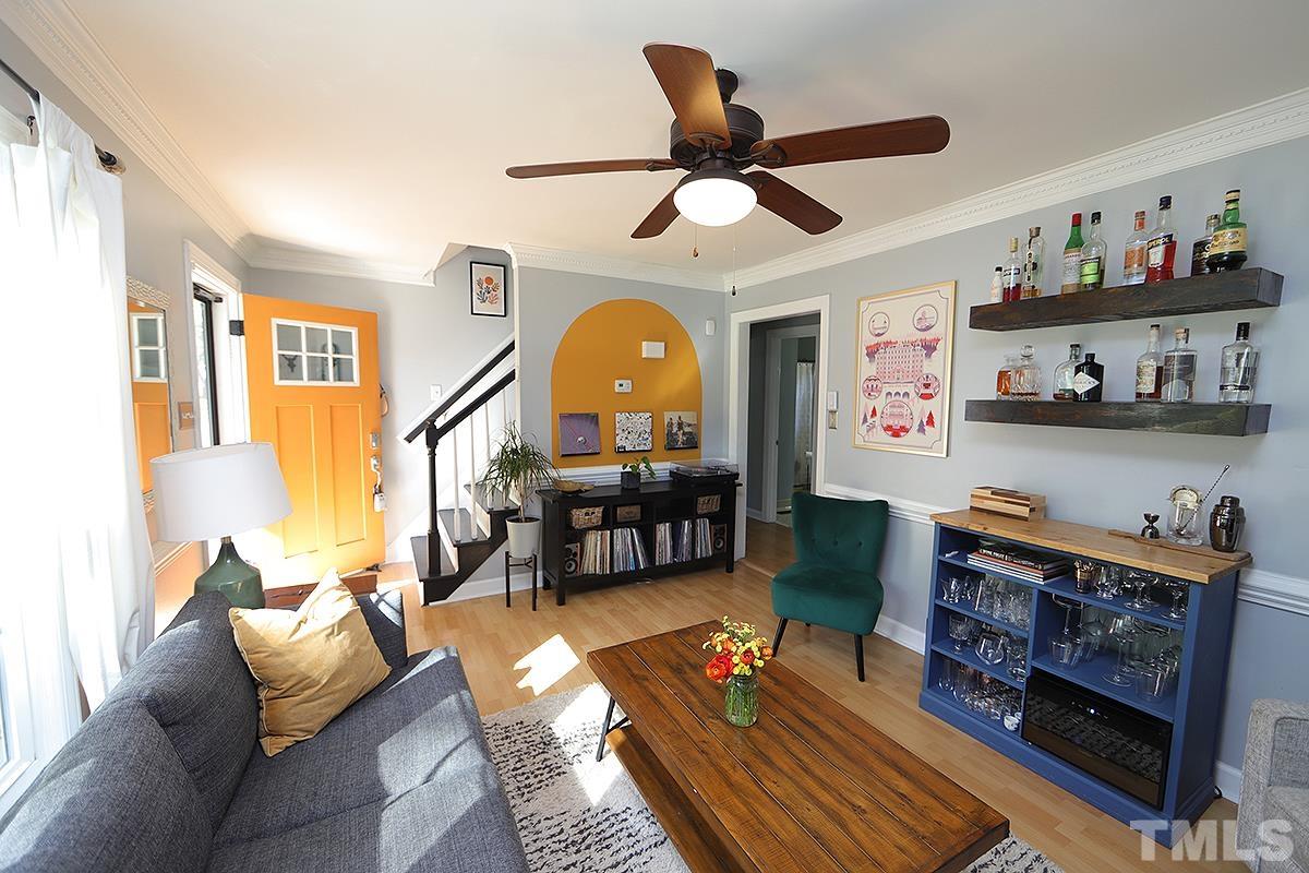 3301 East Jameson Road Raleigh, NC 27604 - Photo 4 of 29 a living room with furniture and a fireplace