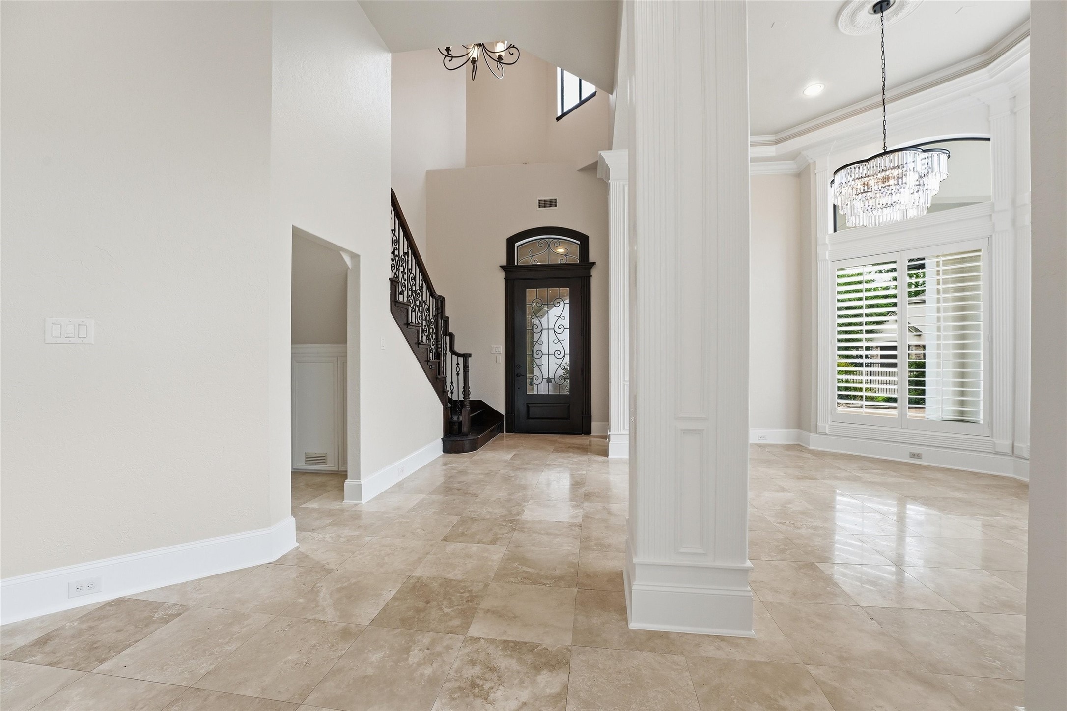 70 Quail Rock Place The Woodlands, TX 77381 - Photo 4 of 46 a view of an entryway with a livingroom