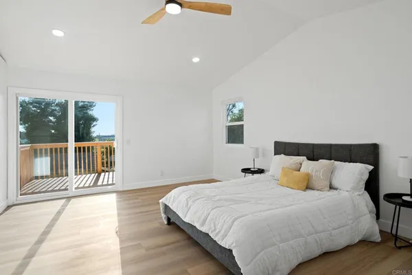 a bedroom with a bed and a walk in closet