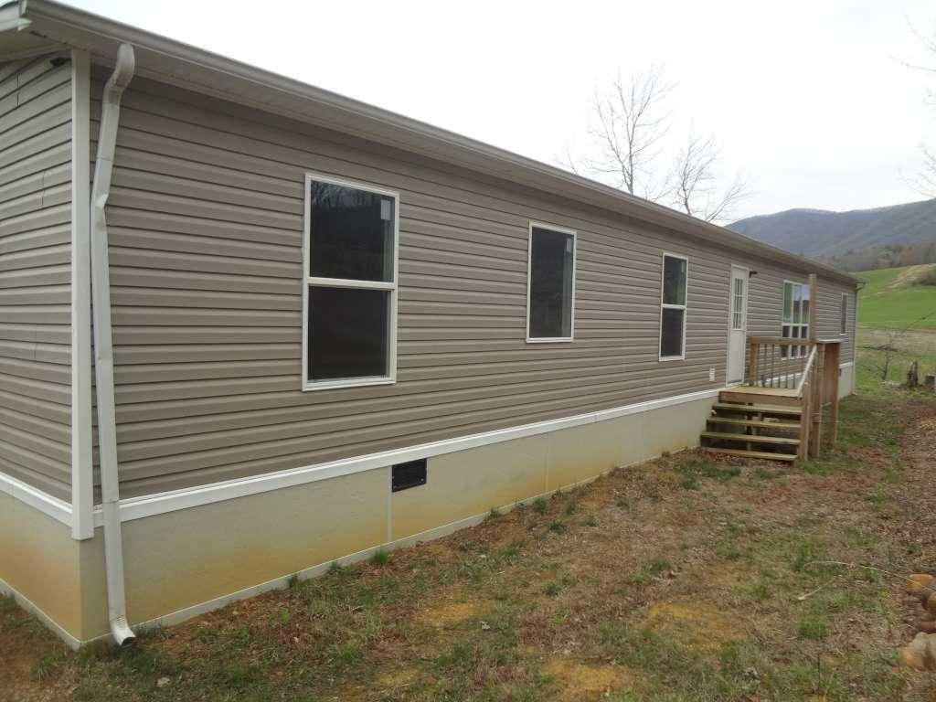 1043 Pine Orchard Road Butler, TN 37640 - Photo 2 of 7 2 Back