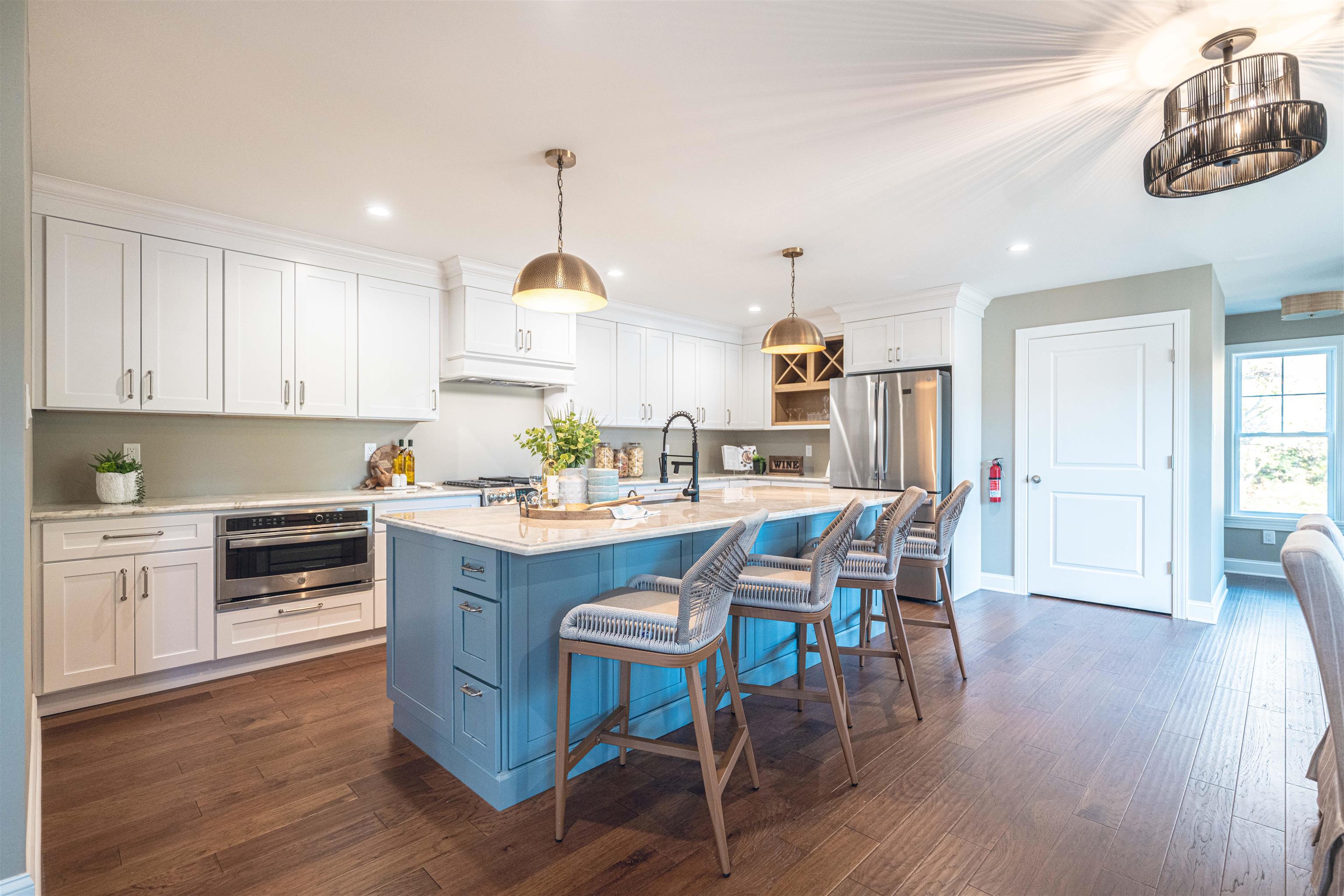 157 Fishing Creek Road North Cape May, NJ 08204 - Photo 12 of 50 a kitchen with granite countertop wooden floors and center island