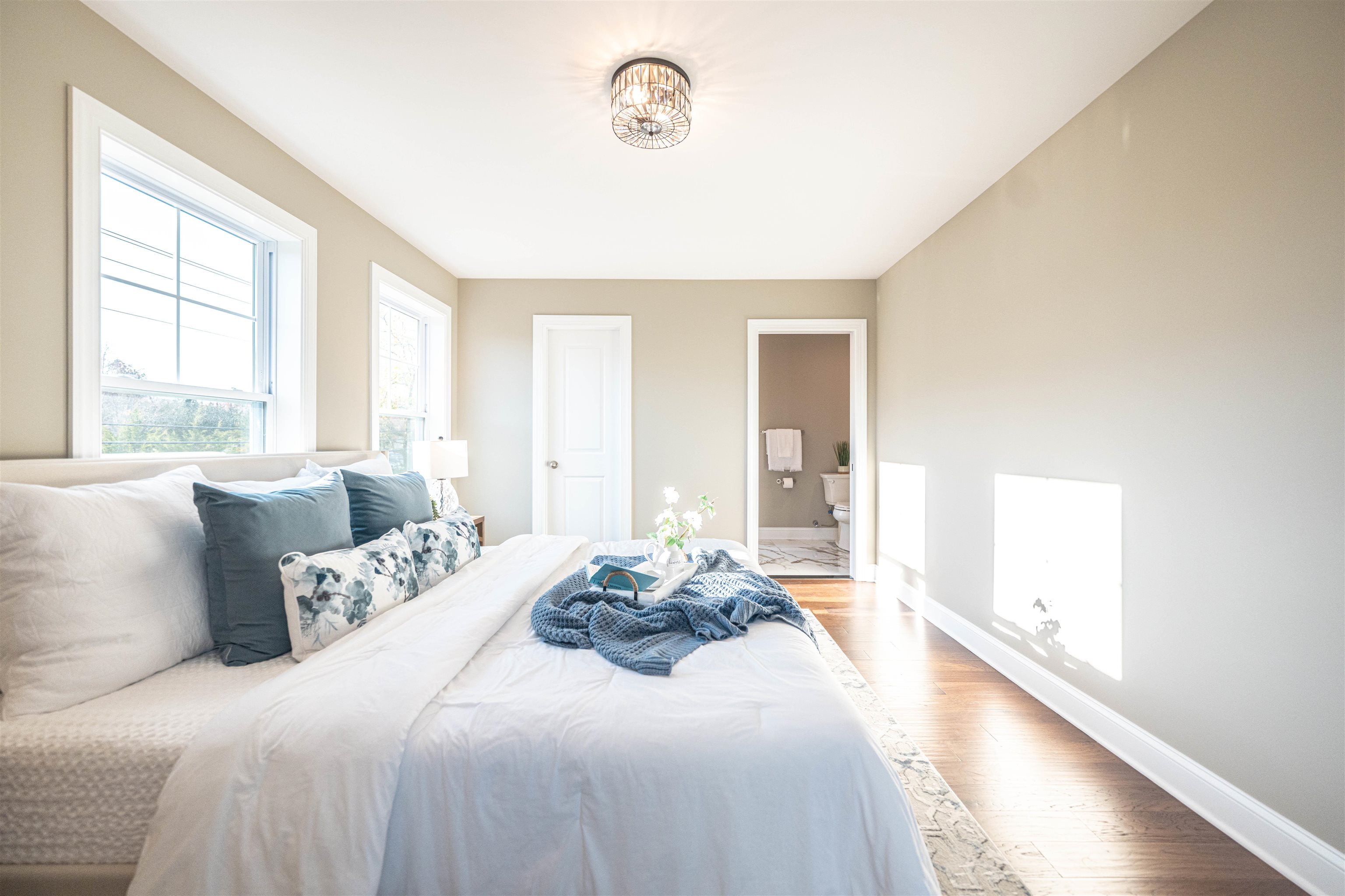 157 Fishing Creek Road North Cape May, NJ 08204 - Photo 22 of 50 a spacious bedroom with a bed and a large window