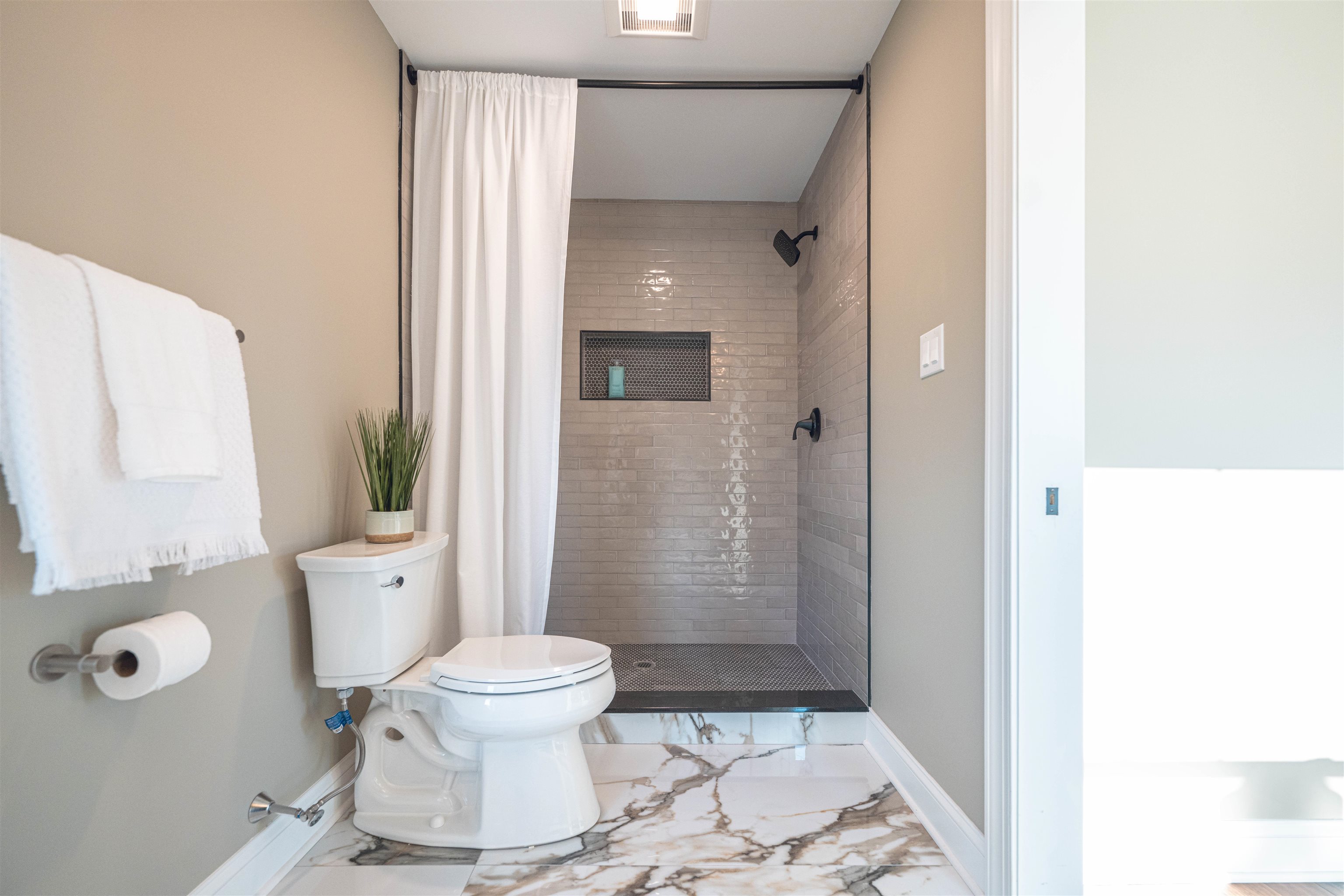 157 Fishing Creek Road North Cape May, NJ 08204 - Photo 25 of 50 a bathroom with a toilet and a shower