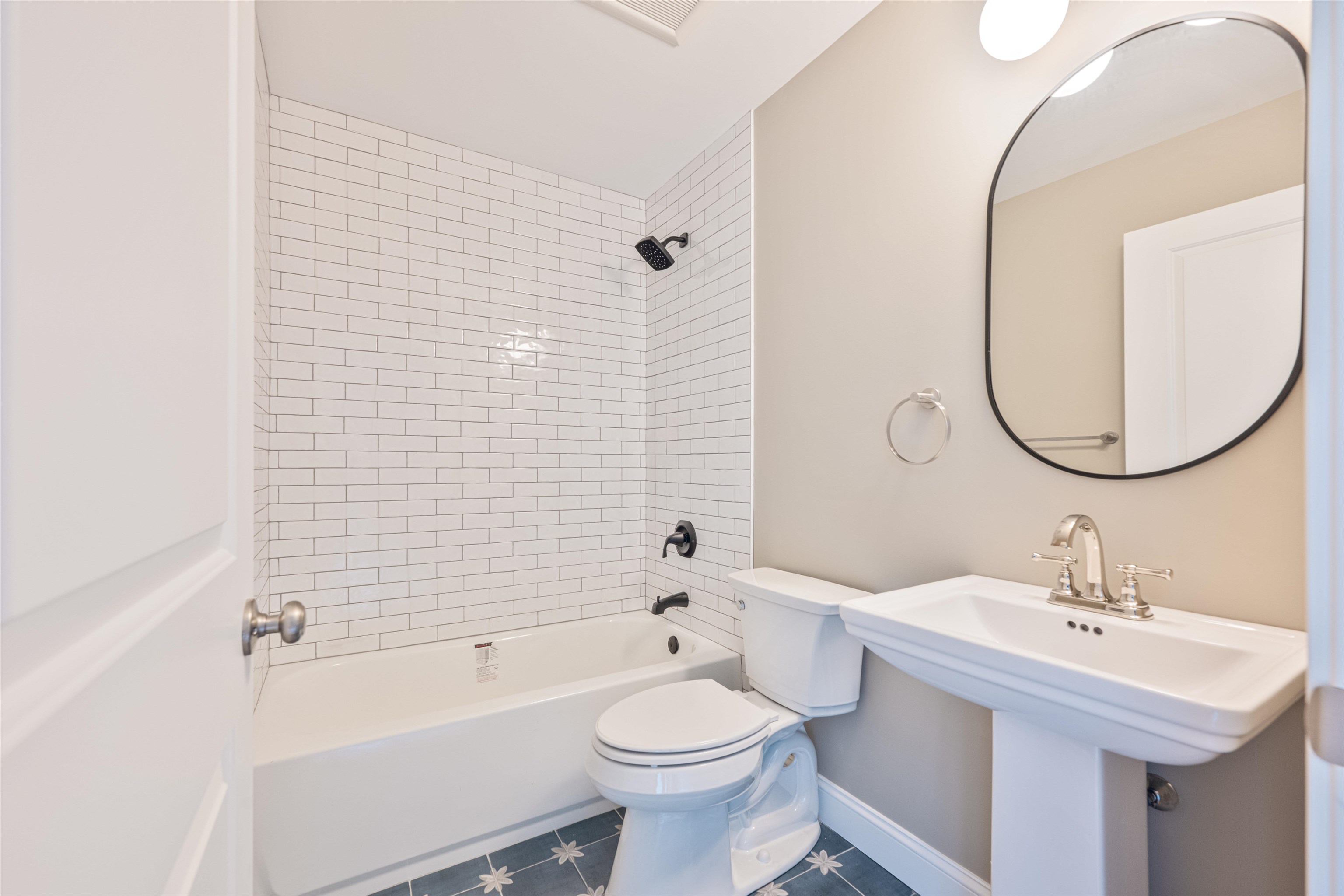 157 Fishing Creek Road North Cape May, NJ 08204 - Photo 37 of 50 a bathroom with a sink a toilet and a mirror