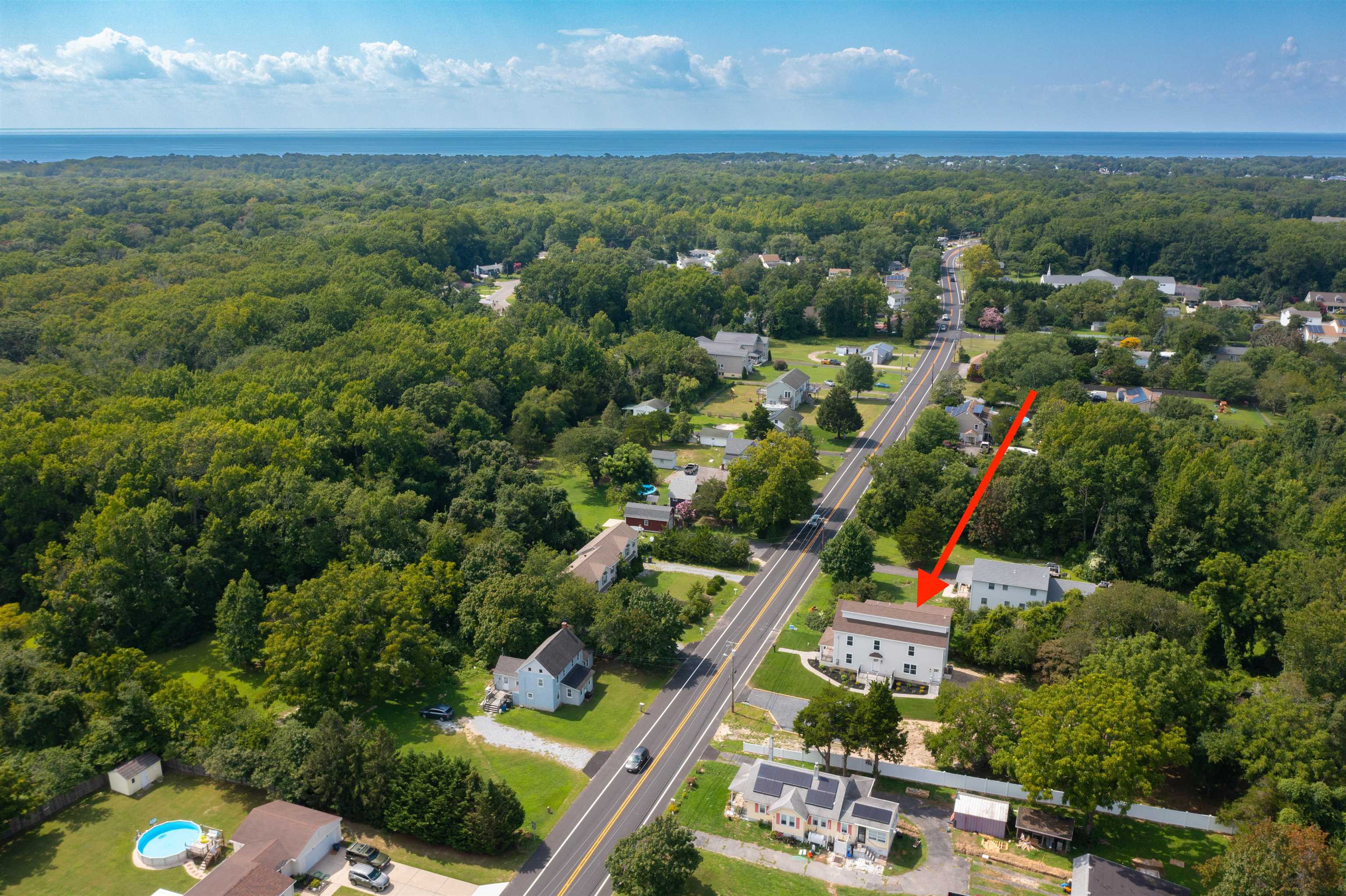 157 Fishing Creek Road North Cape May, NJ 08204 - Photo 50 of 50 an aerial view of a city with lots of residential buildings ocean and mountain view in back
