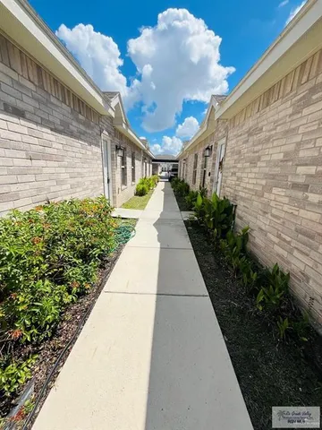 a view of a pathway with a building