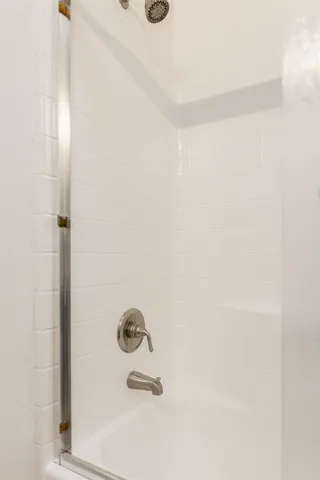 a kitchen with wooden cabinets and a sink