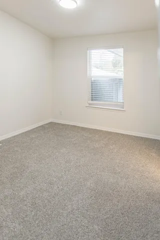 a view of an empty room with window