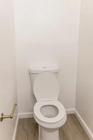 a white bath tub sitting in a bathroom