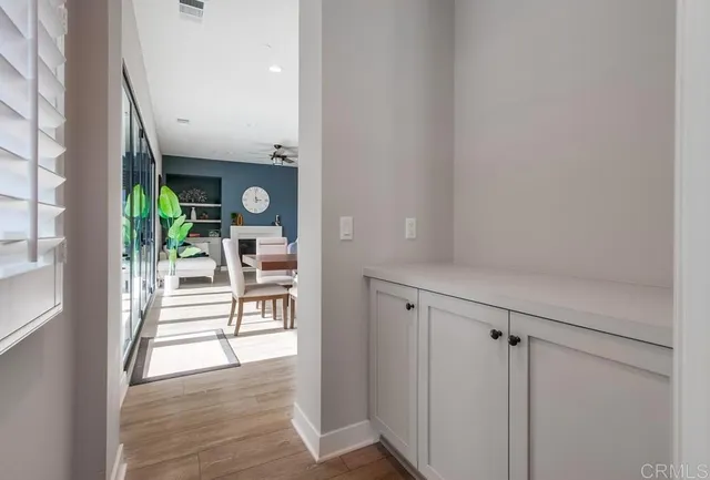a spacious bathroom with a double vanity sink and a mirror