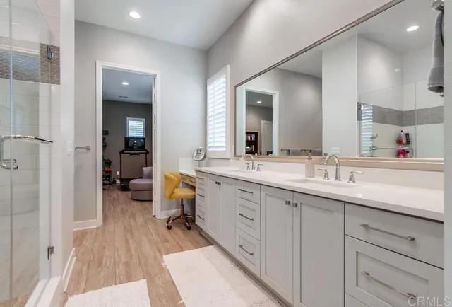 a utility room with sink dryer and washer