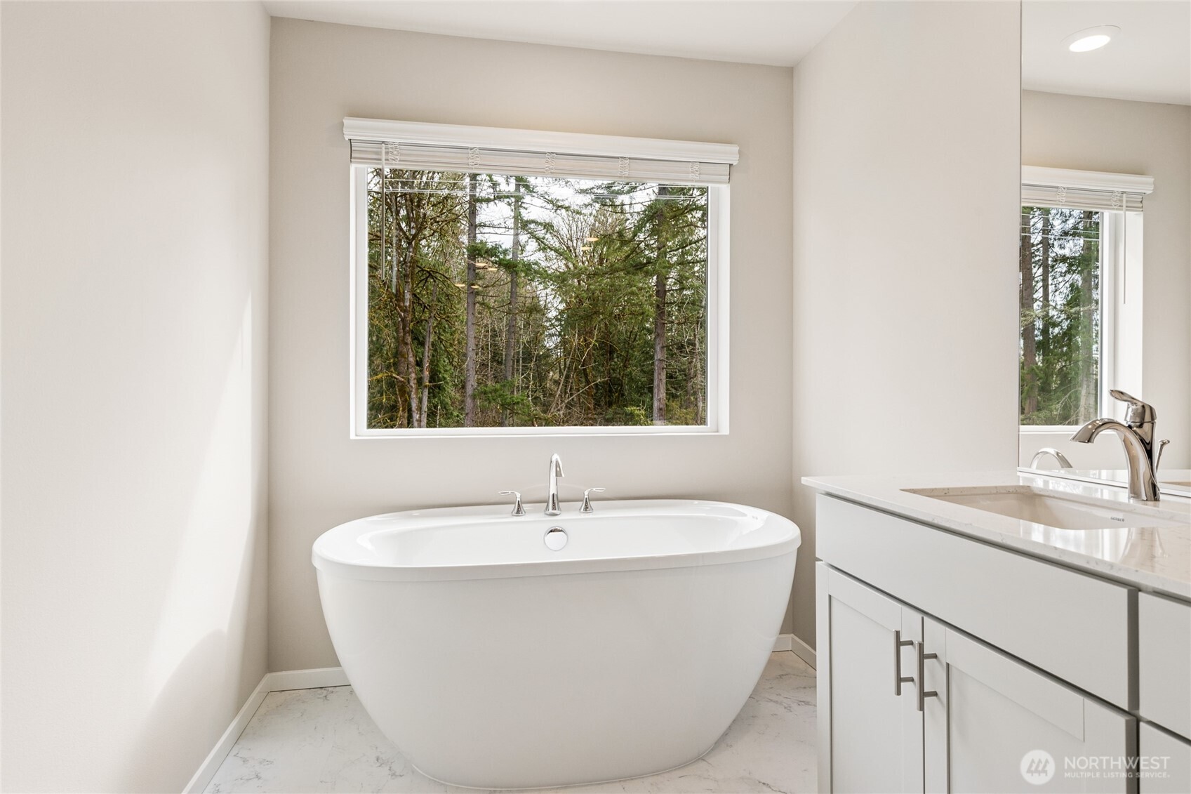 2241 Boxcar Court Northeast, Unit 162 Olympia, WA 98506 - Photo 20 of 21 a white bath tub sitting next to a window