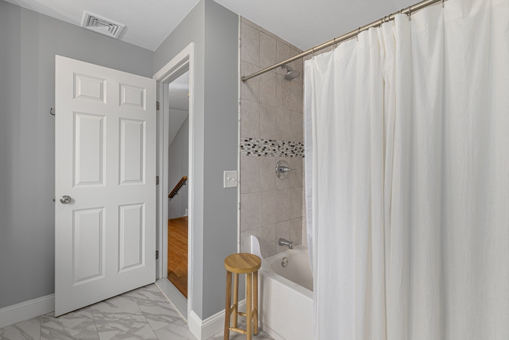 69 Denver Street Fall River, MA 02721 - Photo 32 of 35 a bathroom with a shower and a tub