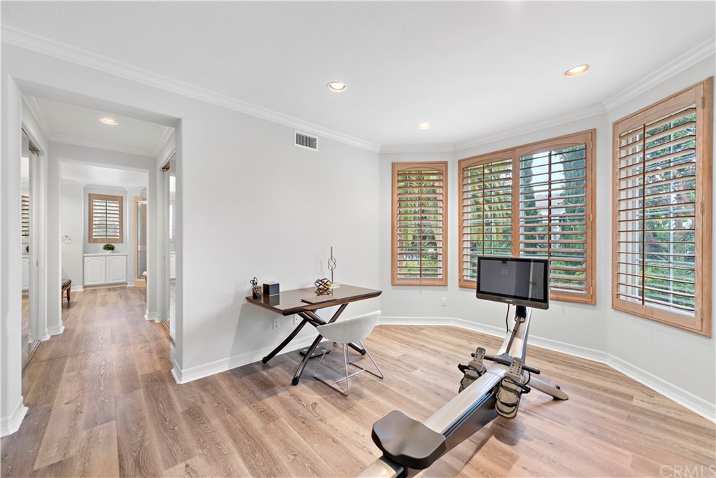 1 Meryton Irvine, CA 92603 - Photo 22 of 42 a view of a livingroom with workspace and windows