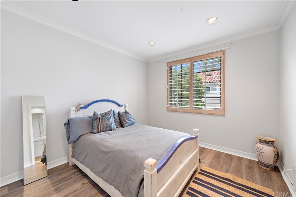 1 Meryton Irvine, CA 92603 - Photo 30 of 42 a bedroom with a large bed and a window