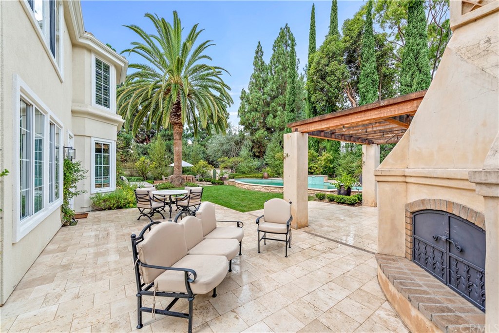 1 Meryton Irvine, CA 92603 - Photo 35 of 42 a view of a patio with a table and chairs