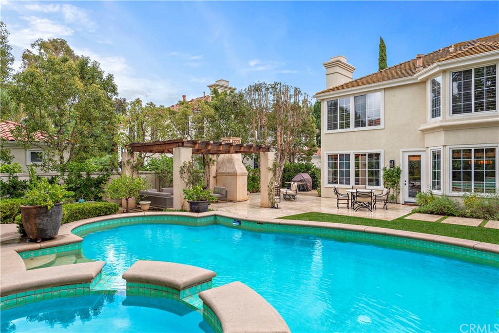 1 Meryton Irvine, CA 92603 - Photo 42 of 42 a view of a house with swimming pool having outdoor seating