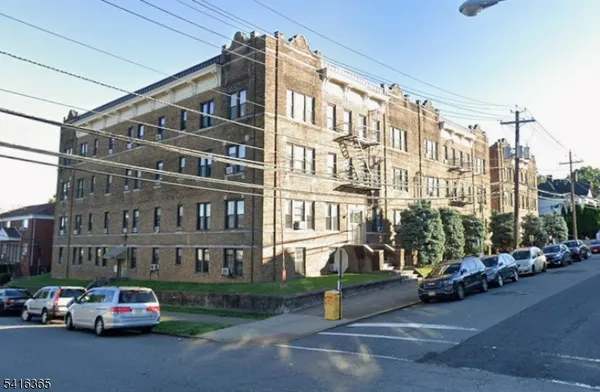 a car parked in front of a building