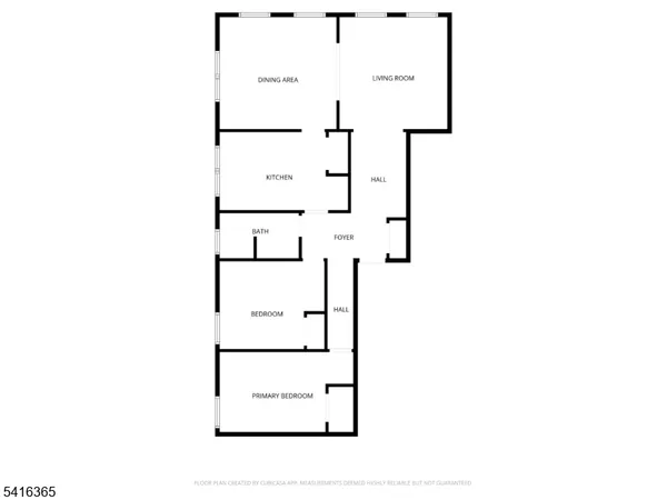 a picture of a bench in front of a white house