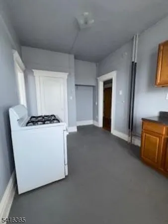 a view of a storage & utility room with washer and dryer
