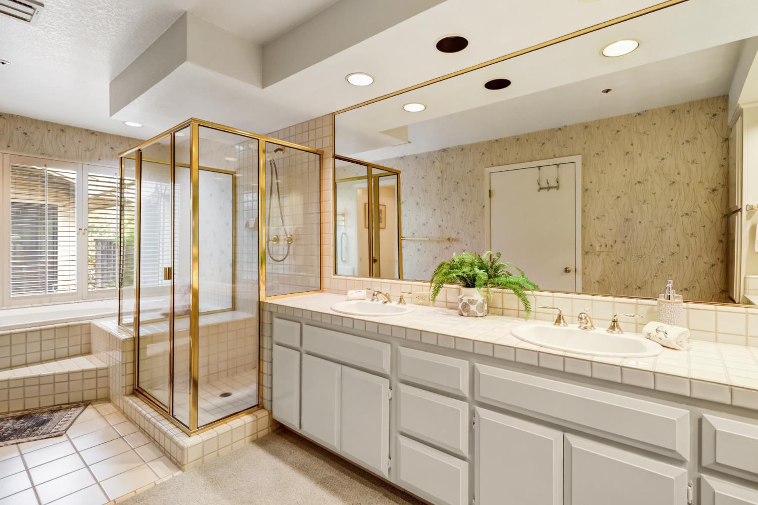 2812 Lacy Lane Sacramento, CA 95821 - Photo 19 of 76 Primary bath with double sinks, and separate tub and shower