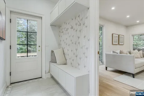 a bathroom with a bathtub and window