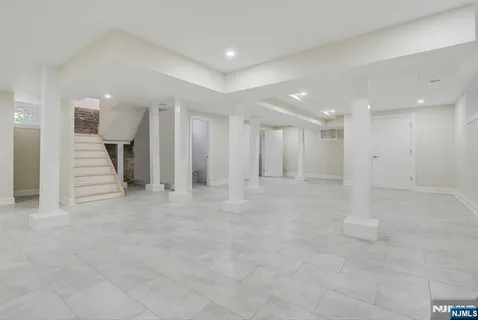 a bedroom with a bed and a table