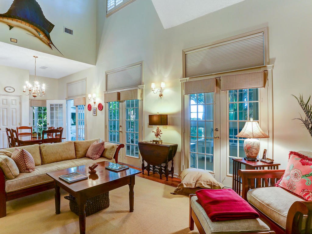 97082 Pirates Point Road Yulee, FL 32097 - Photo 5 of 32 a living room with furniture and a chandelier