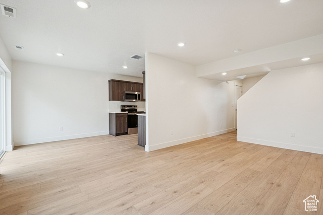 1615 North Angel Street, Unit E Layton, UT 84041 - Photo 18 of 42 Unfurnished living room with recessed lighting and light wood finished floors