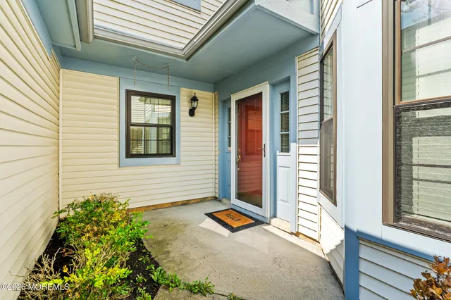 a front view of a house with a garage