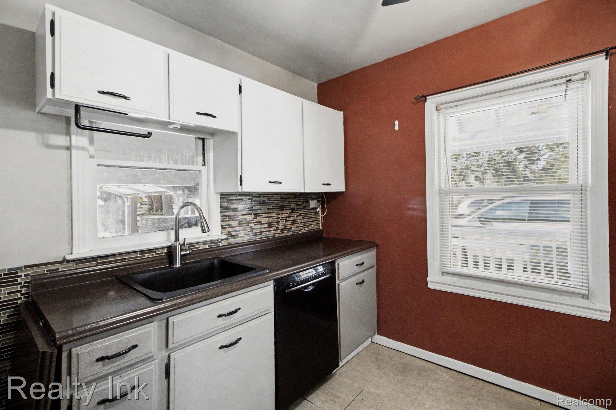 4845 Hatchery Road Waterford, MI 48329 - Photo 6 of 15 Kitchen window brings natural light and opens up the space.