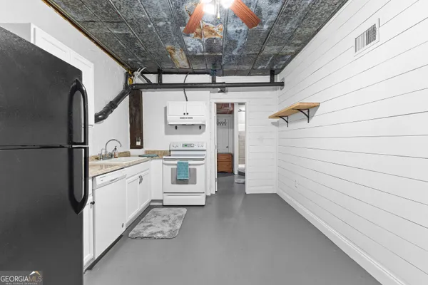 a room with storage and utility
