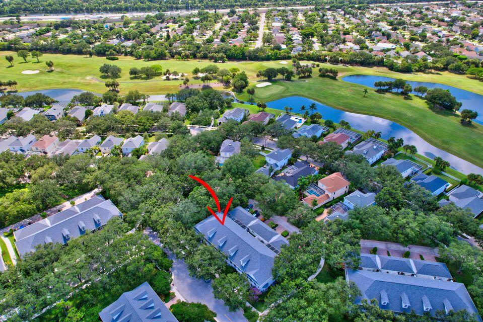 180 Freeport Drive Jupiter, FL 33458 - Photo 51 of 58 an aerial view of house with outdoor space and swimming pool