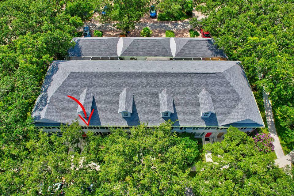180 Freeport Drive Jupiter, FL 33458 - Photo 57 of 58 an aerial view of a house with a yard and garden