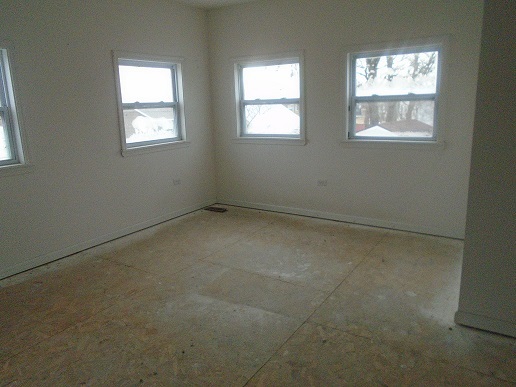 1213 West Main Street Ottawa, IL 61350 - Photo 9 of 10 an empty room with windows
