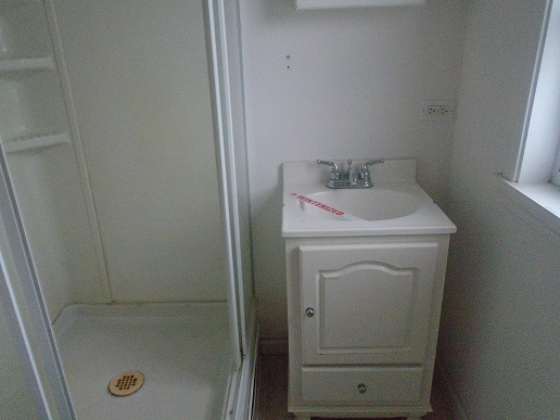 1213 West Main Street Ottawa, IL 61350 - Photo 10 of 10 a utility room with a sink a washer and dryer
