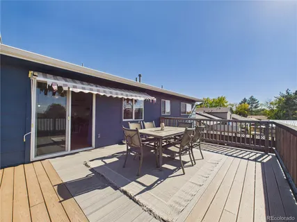 a view of a balcony with chairs