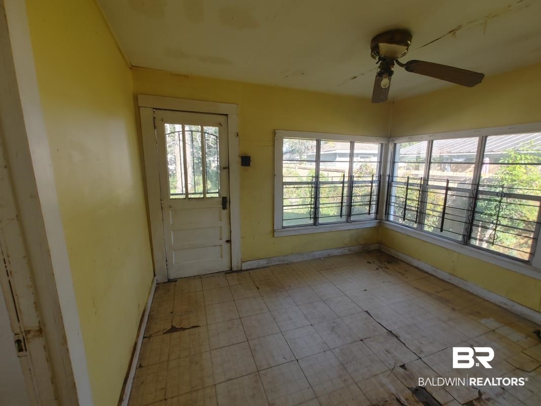 1706 Lomeroy Street Mobile, AL 36604 - Photo 23 of 24 Unfurnished sunroom with ceiling fan