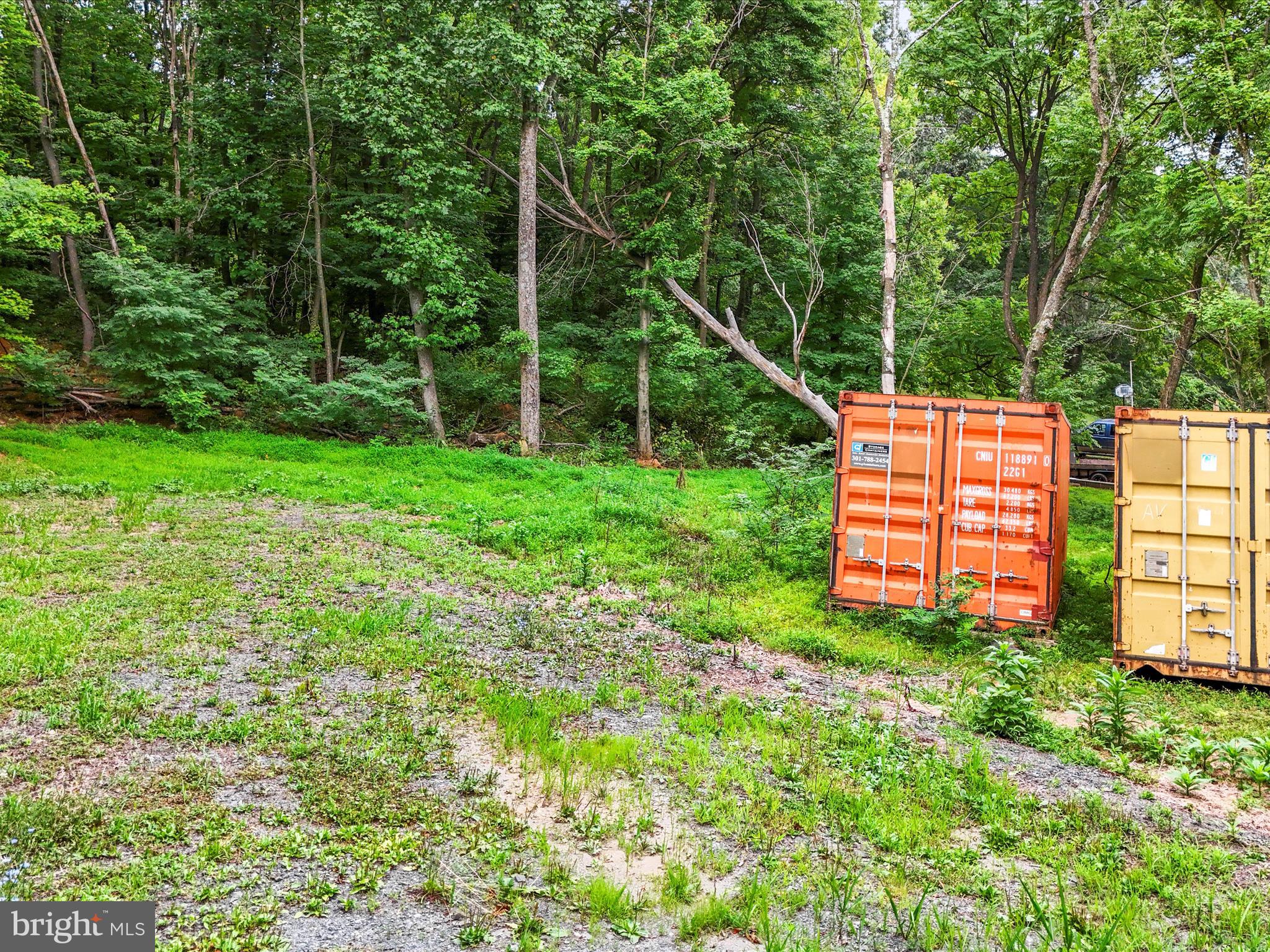 Draper Road Clear Spring, MD 21722 - Photo 9 of 16 a backyard of a house with lots of green space