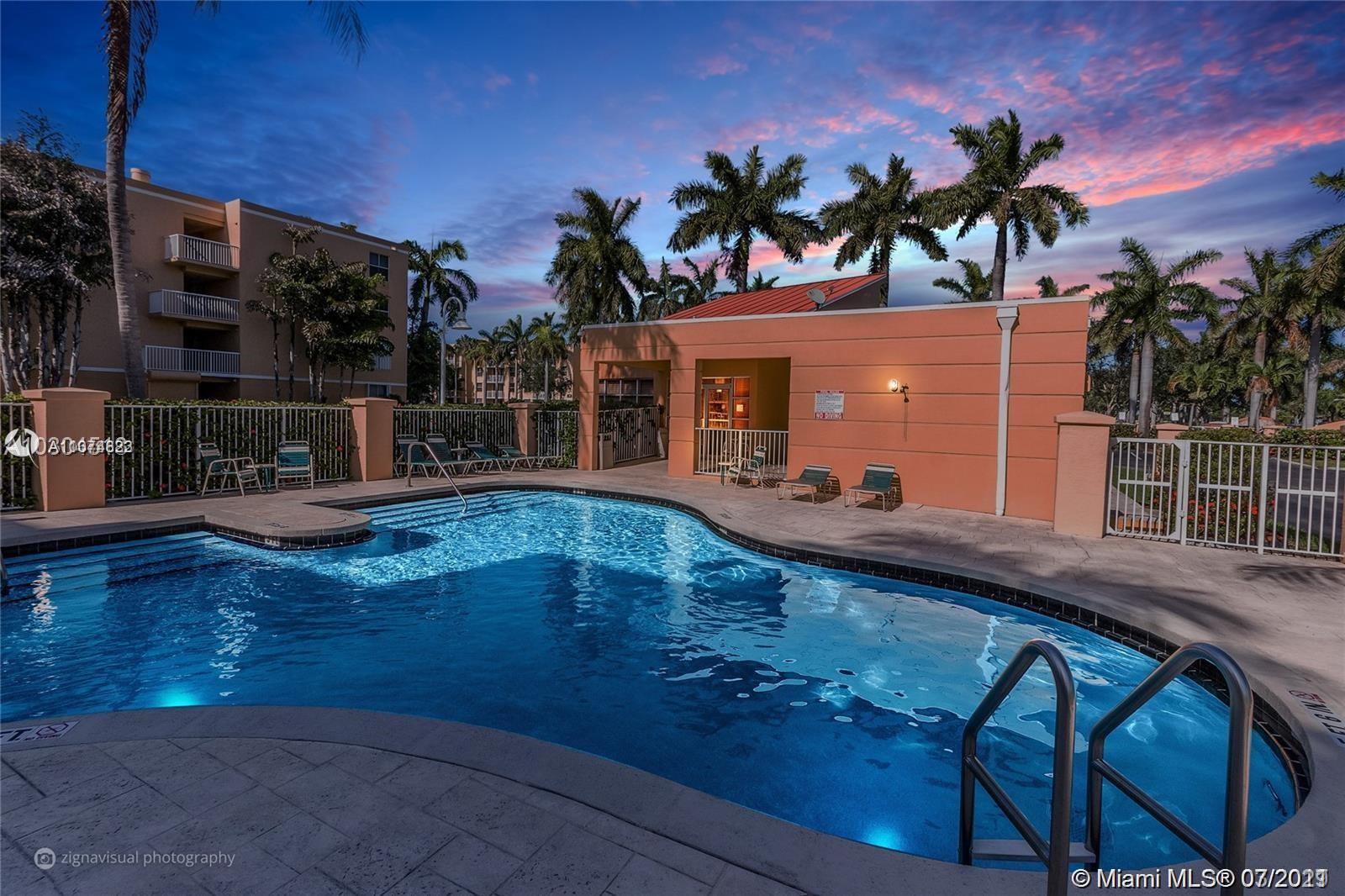 1450 Southeast 3rd Avenue, Unit 107 Dania Beach, FL 33004 - Photo 12 of 15 a view of a house with backyard and sitting area