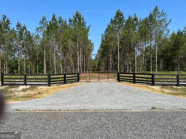 a view of a playground with basketball court