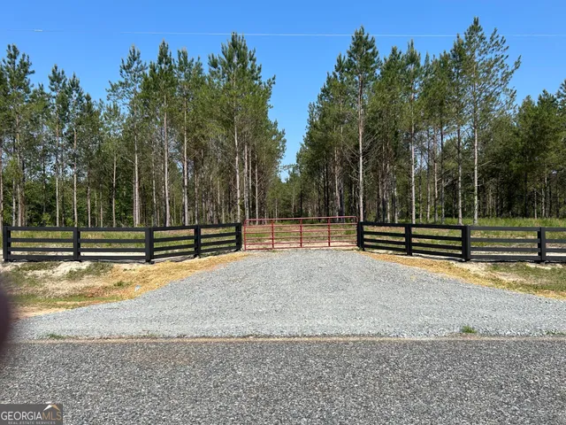 a view of a playground with basketball court