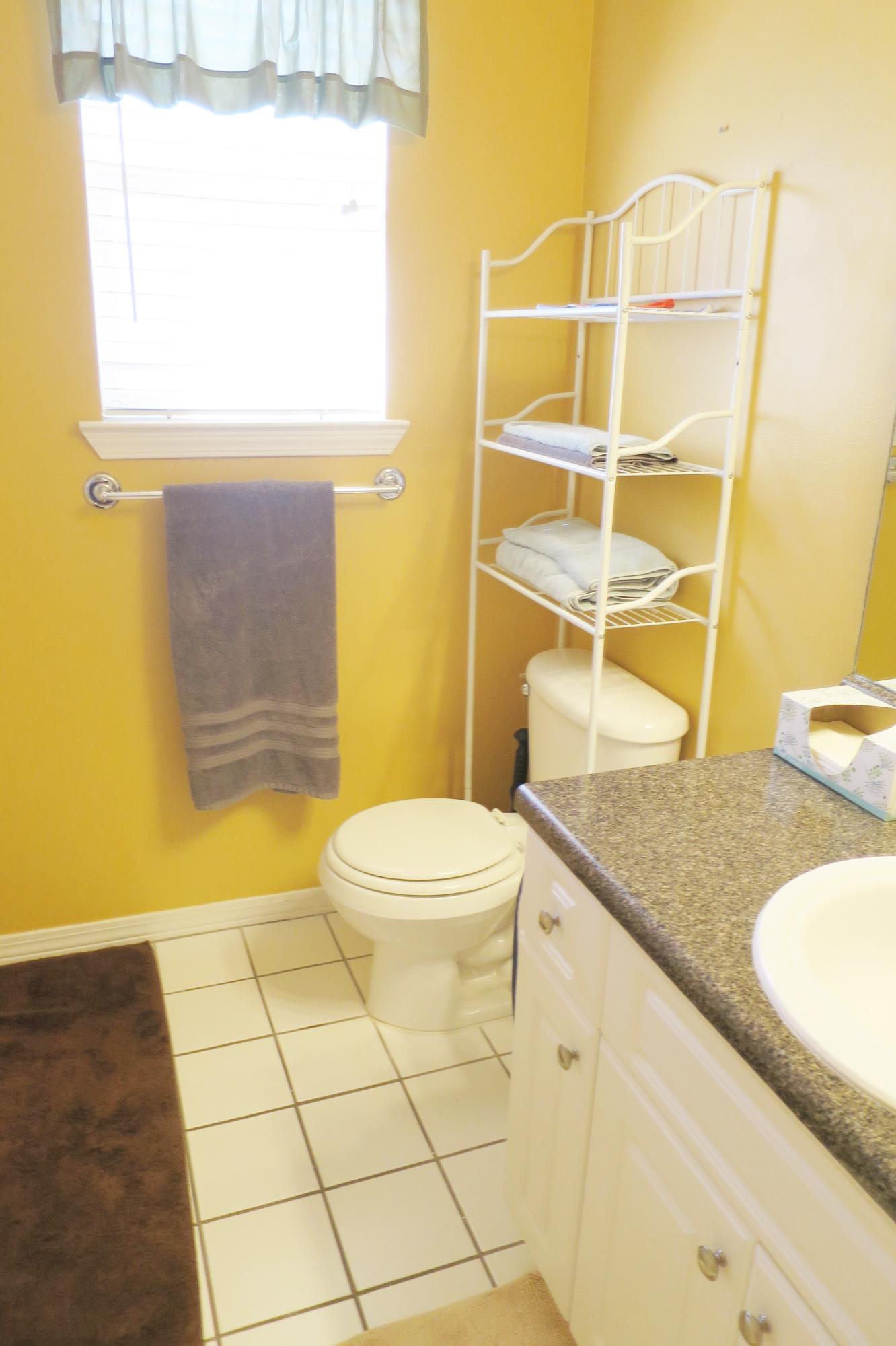 1762 Old Ranch Road Fort Walton Beach, FL 32547 - Photo 17 of 21 a bathroom with a granite countertop sink mirror vanity and toilet